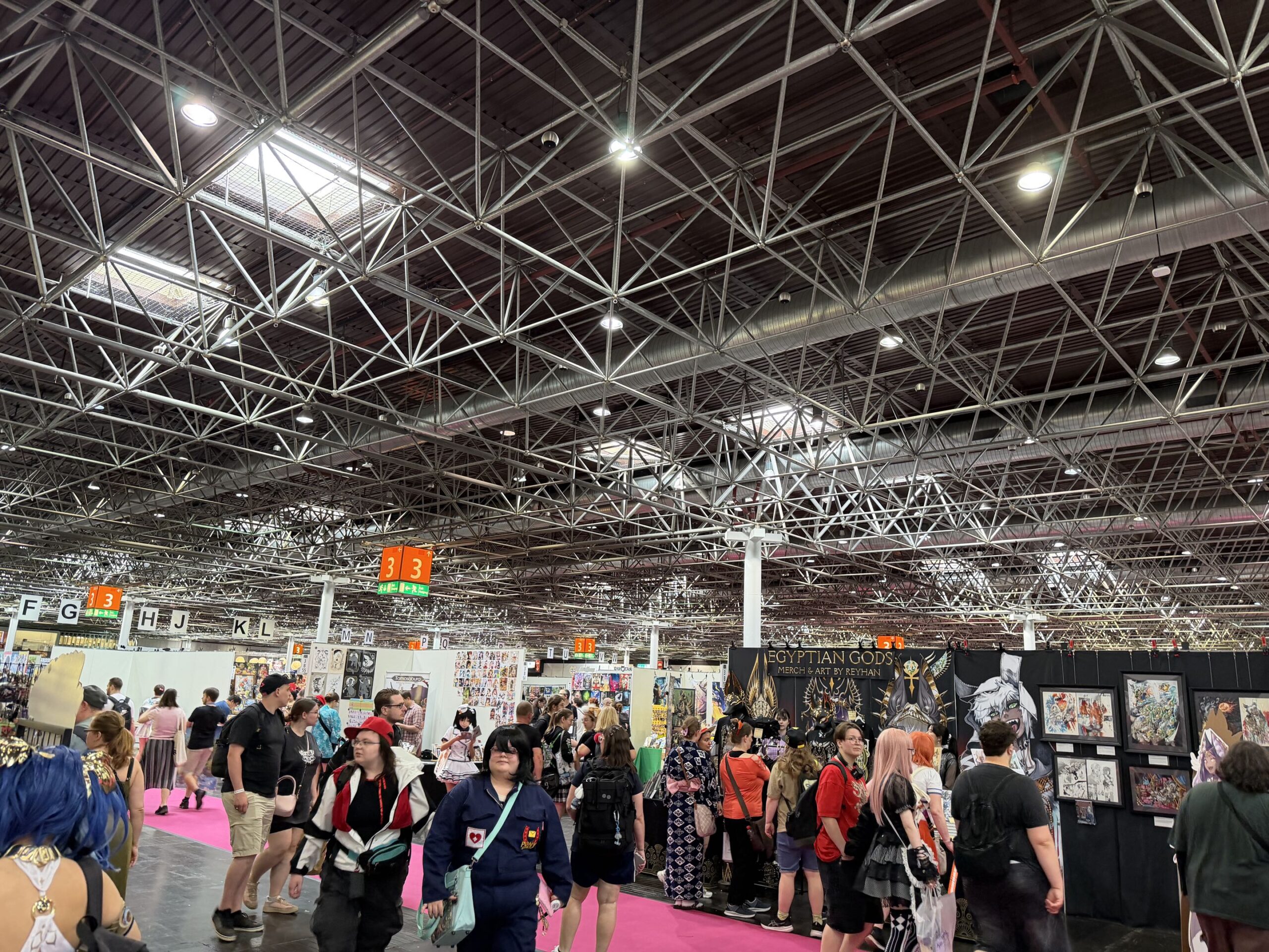 DoKomi 2026 Artist Alley overhead view thousands of attendees rows of booths